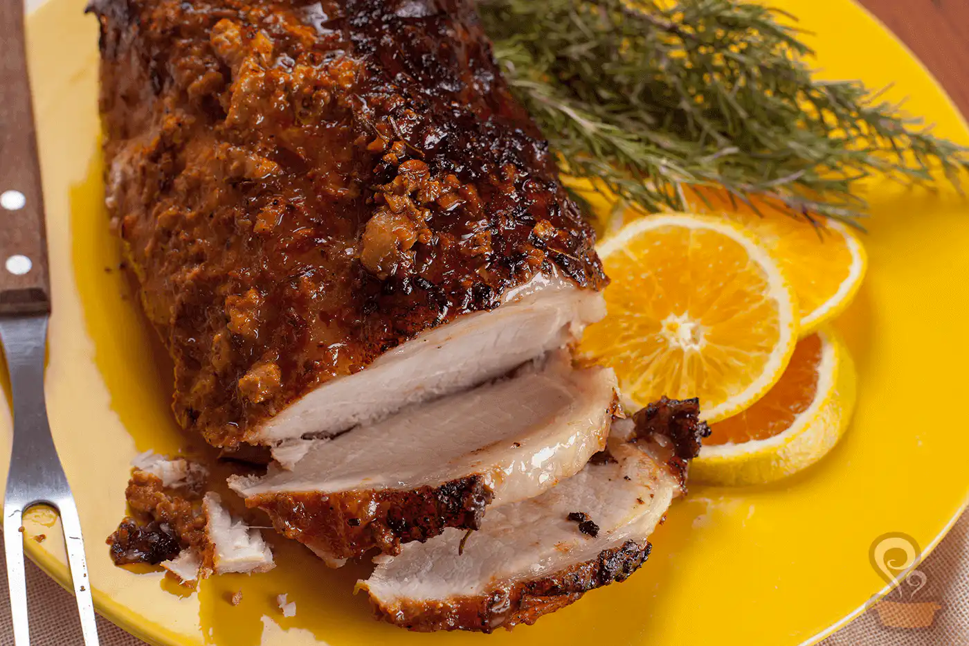 Lombo de porco com laranja e alecrim